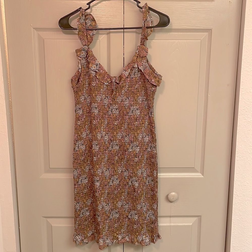 Floral bodycon with ruffle strap dress